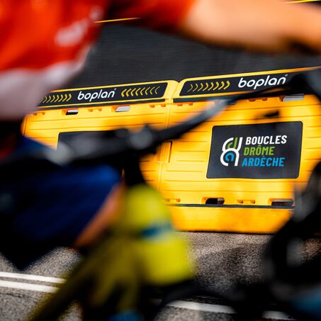 Photo of the Boplan Race Barrier used in a cycling race to protect riders from a collision