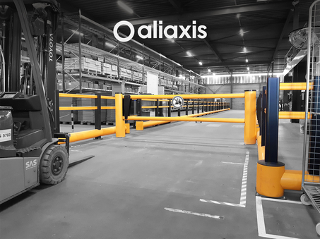 Yellow Boplan DOCK GATE at pedestrian passage way in Aliaxis warehouse