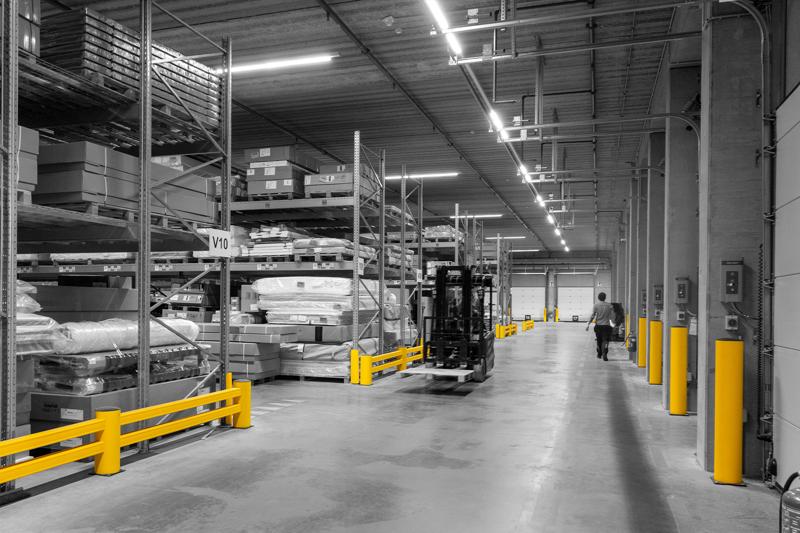 Gelber Boplan BO IMPACT, RE RACKEND, RACKBULL in einem Lager von Sleepworld

