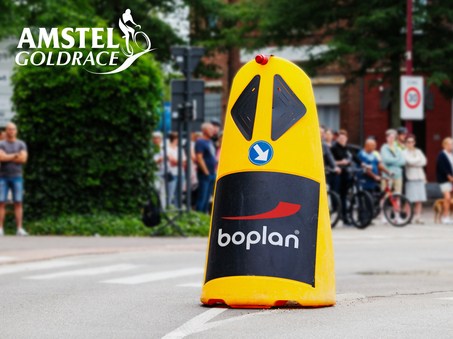 Photo of the Boplan Race Totem used in a cycling race to protect cyclists from a traffic island